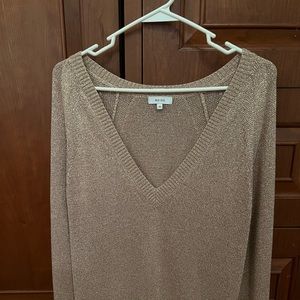Women’s gold v neck sweater.  Sparkly gold